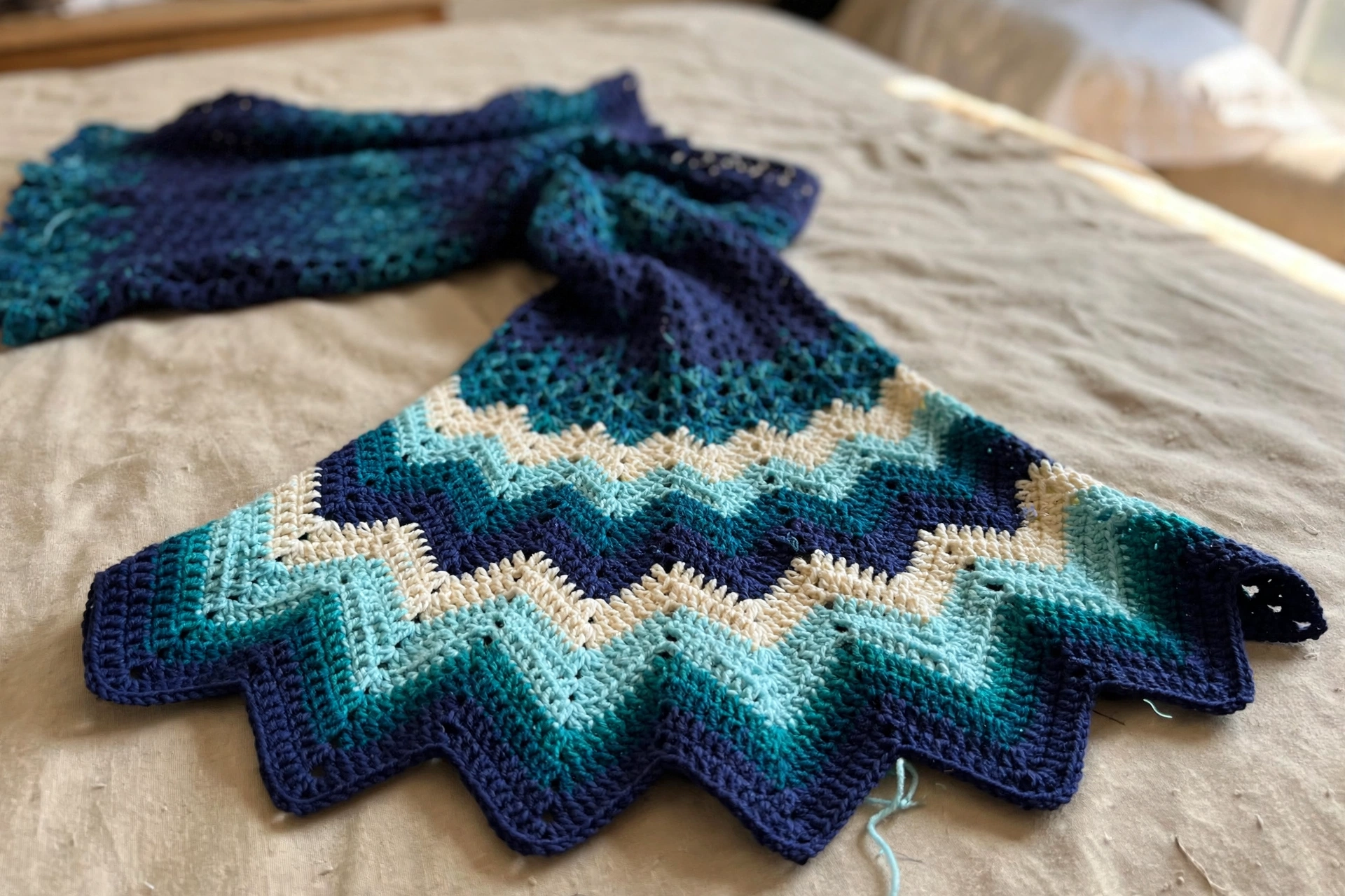 Close-up of the chevron ripple cuff on the bell sleeve of the Coastal Blue Bell Sleeve Dress